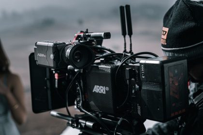 A professional cinema camera filming on a production set
