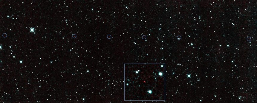 dark rocky asteroid floating against a background of stars