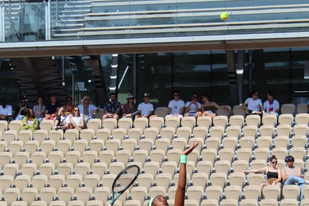 Women's tennis player in action on court