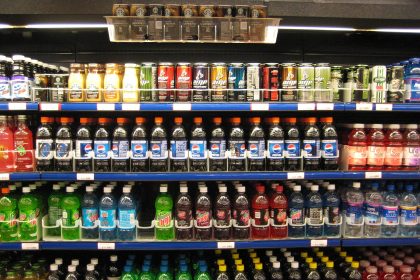 Assorted groceries and packaged foods on a supermarket shelf