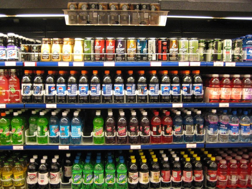 Assorted groceries and packaged foods on a supermarket shelf